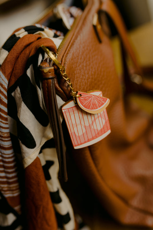 Paloma charm keychain