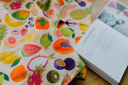 Serviette à thé en coton bio avec autocollants de fruits