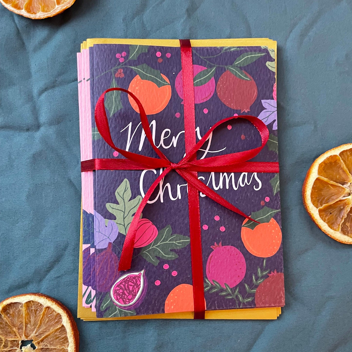 Tarjeta de Feliz Navidad con Frutas Botánicas