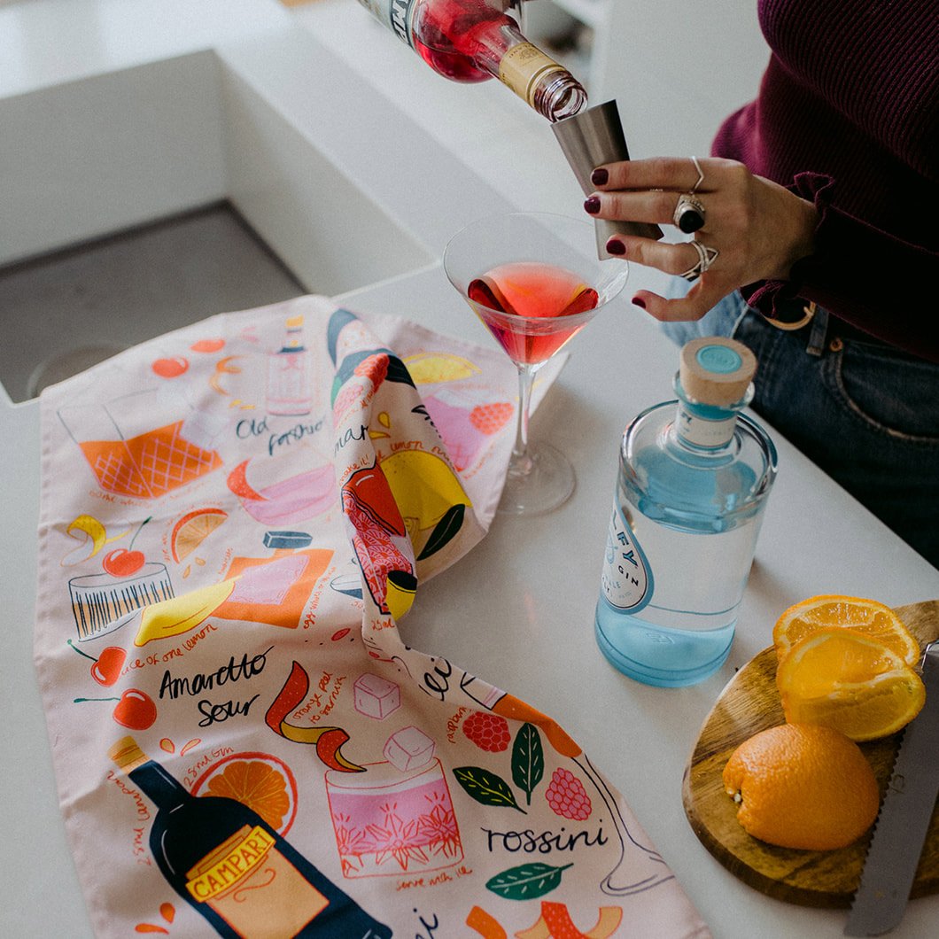 Paño de cocina de algodón orgánico con motivo de cóctel rosa